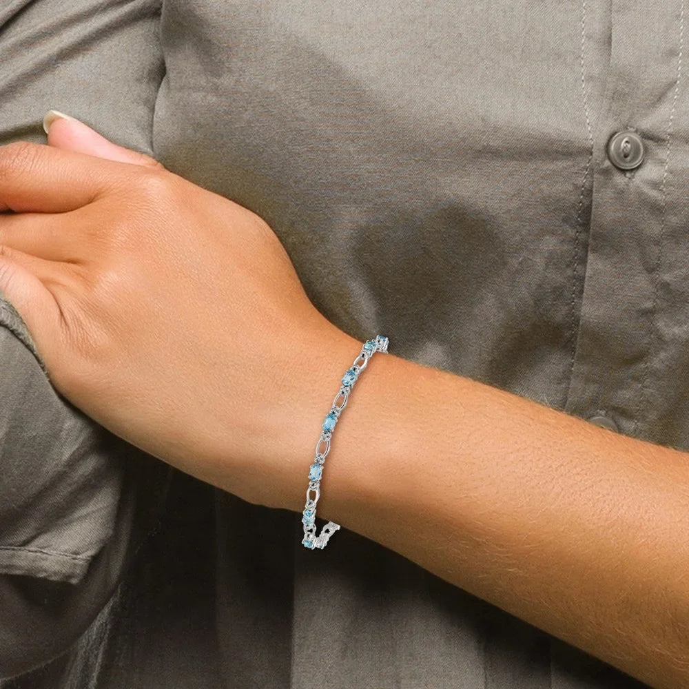 14k White Gold Diamond and Blue Topaz Bracelet QBM4491-BT-010-WA